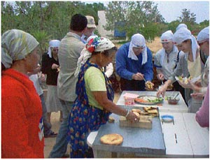 Local women showing how to make Tunisian bread